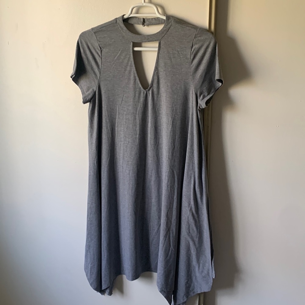 Gray handkerchief dress with 2 button details on the back of the neck!